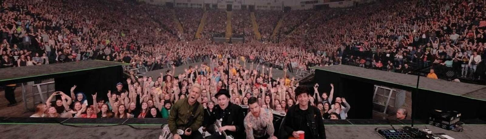 photo of fans and performers at a concert in the nutter center